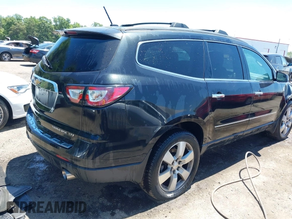 2015 Chevrolet Traverse LTZ with VIN 1GNKVJKDXFJ279029, listed as a IAAI auction lot 39694033 with 151,241 mi miles and . Bid and sale history available at DreamBid. Image 4.