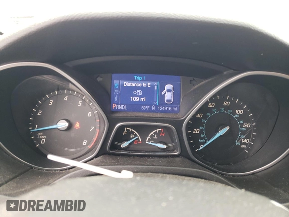 2013 Ford Focus SE z VIN 1FADP3F25DL204052, wystawiony jako Copart lot #57662695 z przebiegiem 124 916 mil mil oraz Szkoda całkowita • Salvage title. Historia ofert i sprzedaży dostępna na DreamBid. Obrazek 9.