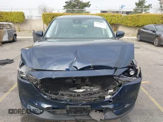 2019 Mazda CX-5 Touring with VIN JM3KFACM5K0697137, listed as a IAAI auction lot 41720253 with 50,416 mi miles. Bid and sale history available at carsss.com. Image 12.