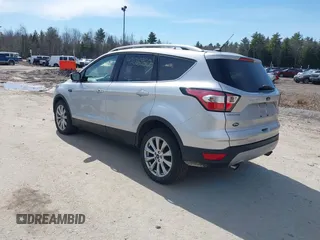 2017 Ford Escape Titanium with VIN 1FMCU9JD3HUE03686, listed as a IAAI auction lot 42016950 with 82,299 mi miles. Bid and sale history available at carsss.com. Image 3.