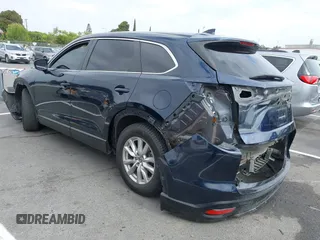 2016 Mazda CX-9 Sport with VIN JM3TCABY3G0123239, listed as a IAAI auction lot 42570700 with 119,414 mi miles and . Bid and sale history available at DreamBid. Image 3.