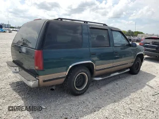1995 Chevrolet Tahoe z VIN 1GNEC13K1SJ439759, wystawiony jako Copart lot #57784845 z przebiegiem 190 566 mil mil oraz Czysty tytuł • Clean title. Historia ofert i sprzedaży dostępna na DreamBid. Obrazek 3.