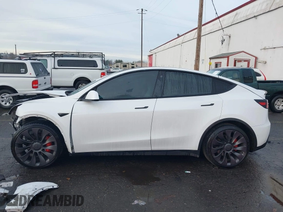 2021 Tesla Model Y Performance z VIN 5YJYGDEF2MF133739, wystawiony jako IAAI lot #41226429 z przebiegiem 58 502 mil mil oraz . Historia ofert i sprzedaży dostępna na DreamBid. Obrazek 14.