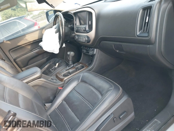 2018 GMC Canyon 2WD Denali z VIN 1GTG5EENXJ1256837, wystawiony jako IAAI lot #42139397 z przebiegiem 93 024 mil mil oraz . Historia ofert i sprzedaży dostępna na DreamBid. Obrazek 5.