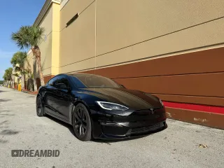 2022 Tesla Model S z VIN 5YJSA1E52NF478767, wystawiony jako Copart lot #61108925 z przebiegiem 16 309 mil mil oraz Czysty tytuł • Clean title. Historia ofert i sprzedaży dostępna na DreamBid. Obrazek 1.