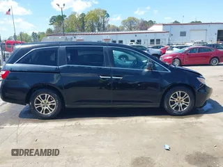 2013 Honda Odyssey EX-L с VIN 5FNRL5H66DB073076, выставлен на аукционе IAAI как лот 41886808 с пробегом 185 760 миль миль и . История ставок и продаж доступна на DreamBid. Изображение 14.