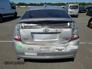 2007 Toyota Prius z VIN JTDKB20U577620457, wystawiony jako Copart lot #86045044 z przebiegiem 175 085 mil mil oraz Nie do naprawy • Non repairable. Historia ofert i sprzedaży dostępna na DreamBid. Obrazek 6.