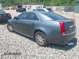2011 Cadillac CTS with VIN 1G6DC5EY0B0163841, listed as a IAAI auction lot 42409886 with 119,231 mi miles and . Bid and sale history available at DreamBid. Image 3.