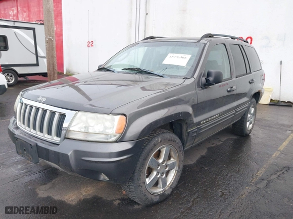 2004 Jeep Grand Cherokee Limited with VIN 1J4GW58N34C399673, listed as a IAAI auction lot 41976505 with 194,005 mi miles. Bid and sale history available at carsss.com. Image 2.