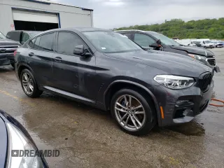 2021 BMW X4 M40i with VIN 5UX2V5C08M9E17162, listed as a Copart auction lot 67602073 with 33,879 mi miles. Bid and sale history available at carsss.com. Image 4.