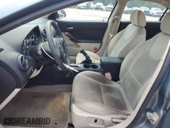 2009 Pontiac G6 1SA with VIN 1G2ZG57B294112753, listed as a Copart auction lot 60333295 with 172,422 mi miles and Salvage title. Bid and sale history available at DreamBid. Image 7.