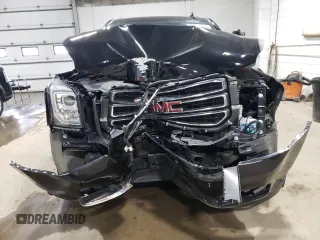 2019 GMC Yukon SLT Standard Edition with VIN 1GKS2DKC4KR393344, listed as a Copart auction lot 51942674 with 76,147 mi miles. Bid and sale history available at carsss.com. Image 5.