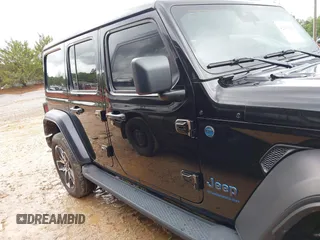 2024 Jeep Wrangler Willys z VIN 1C4RJXN60RW317717, wystawiony jako IAAI lot #42017788 z przebiegiem 10 096 mil mil oraz . Historia ofert i sprzedaży dostępna na DreamBid. Obrazek 13.