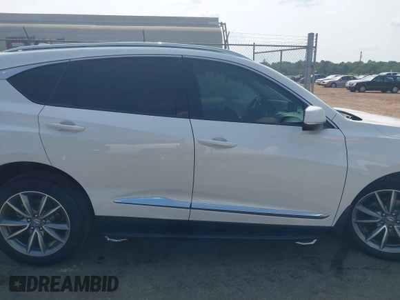 2021 Acura RDX Technology with VIN 5J8TC1H58ML009948, listed as a IAAI auction lot 42402678 with 113,463 mi miles and . Bid and sale history available at DreamBid. Image 13.