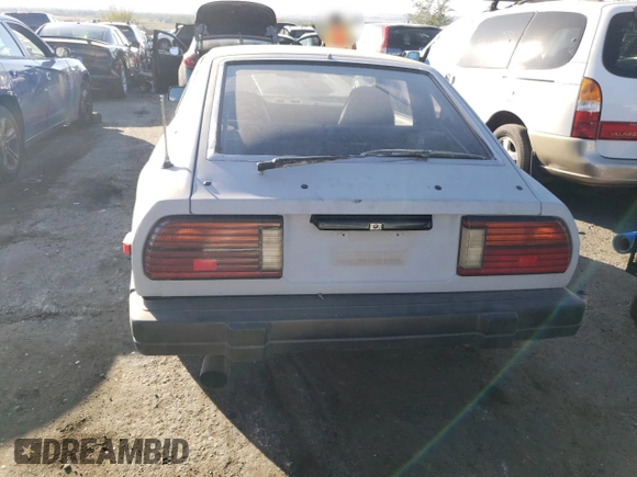 1983 Datsun 280ZX 2+2 z VIN JN1HZ06S2DX506351, wystawiony jako Copart lot #74302484 z przebiegiem 17 211 mil mil oraz Szkody całkowita. Historia ofert i sprzedaży dostępna na DreamBid. Obrazek 6.