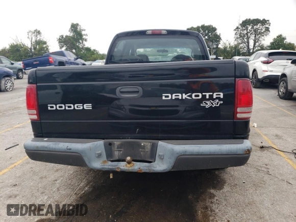 2004 Dodge Dakota Sport with VIN 1D7HL38K04S553703, listed as a Copart auction lot 70974374 with 0 mi miles and Salvage Title. Bid and sale history available at carsss.com. Image 6.