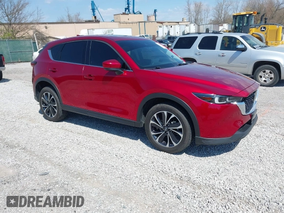 2022 Mazda CX-5 2.5 S Premium Package with VIN JM3KFBDM5N1532837, listed as a IAAI auction lot 41869721 with 59,249 mi miles. Bid and sale history available at carsss.com. Image 1.