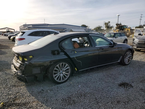 2019 BMW 7 Series 750i with VIN WBA7F0C57KGM24576, listed as a Copart auction lot 47778515 with 94,701 mi miles and Salvage Title. Bid and sale history available at carsss.com. Image 3.