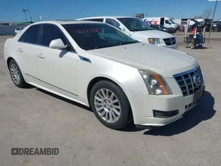 2013 Cadillac CTS Luxury z VIN 1G6DG5E58D0101696, wystawiony jako IAAI lot #41723087 z przebiegiem 107 347 mil mil oraz . Historia ofert i sprzedaży dostępna na DreamBid. Obrazek 1.