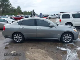 2007 Infiniti M Sport z VIN JNKAY01E47M308944, wystawiony jako IAAI lot #41514395 z przebiegiem 166 936 mil mil oraz . Historia ofert i sprzedaży dostępna na DreamBid. Obrazek 13.