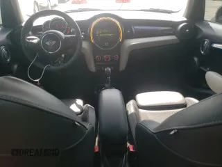 2016 MINI Hardtop 4 Door S with VIN WMWXU3C58G2B67264, listed as a Copart auction lot 61454215 with 66,550 mi miles and Salvage title. Bid and sale history available at DreamBid. Image 8.