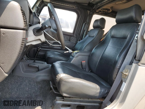 2001 Jeep Wrangler Sport с VIN 1J4FA49S41P353878, выставлен на аукционе Copart как лот 64637385 с пробегом 166 642 миль миль и Списание • Salvage title. История ставок и продаж доступна на DreamBid. Изображение 7.