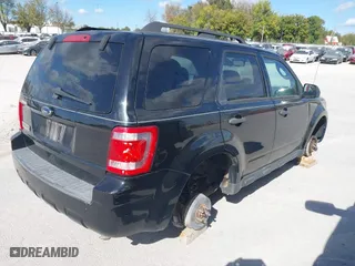 2010 Ford Escape XLT with VIN 1FMCU9D74AKC23611, listed as a IAAI auction lot 40600485 with 171,152 mi miles. Bid and sale history available at carsss.com. Image 4.