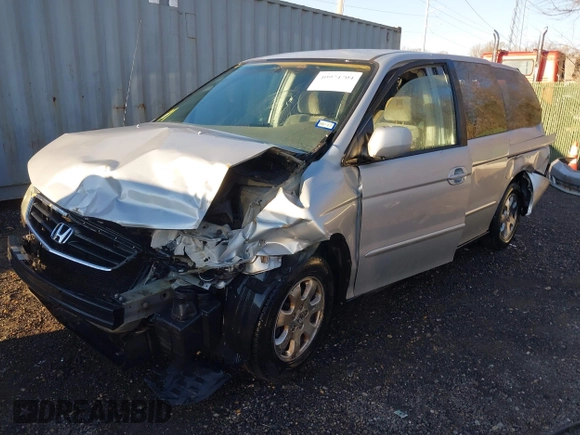 2002 Honda Odyssey EX z VIN 2HKRL18652H566576, wystawiony jako IAAI lot #40974704 z przebiegiem 232 172 mil mil oraz . Historia ofert i sprzedaży dostępna na DreamBid. Obrazek 17.