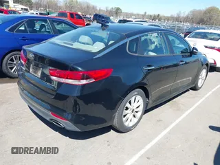 2016 Kia Optima LX with VIN 5XXGT4L3XGG013835, listed as a IAAI auction lot 41815349 with 120,628 mi miles and . Bid and sale history available at carsss.com. Image 4.