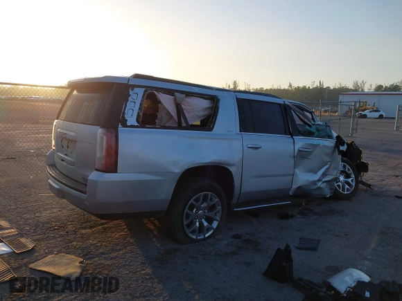 2020 GMC Yukon XL SLT z VIN 1GKS1GKC6LR238395, wystawiony jako IAAI lot #41522887 z przebiegiem Nie podano mil oraz . Historia ofert i sprzedaży dostępna na DreamBid. Obrazek 4.