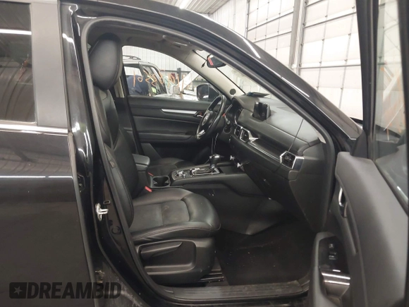 2020 Mazda CX-5 Touring with VIN JM3KFBCM9L1785125, listed as a IAAI auction lot 41983561 with 101,062 mi miles and . Bid and sale history available at carsss.com. Image 5.