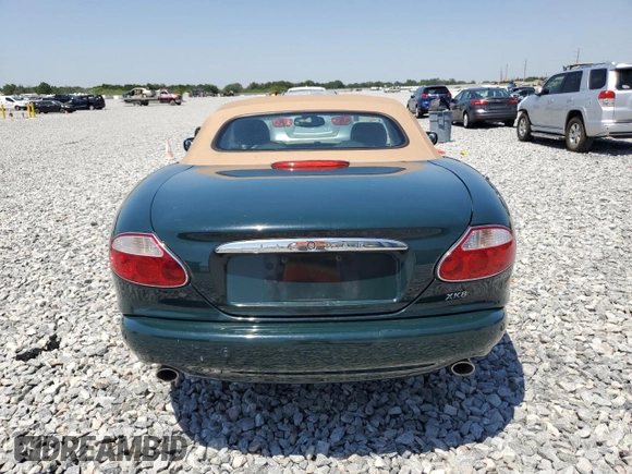 2002 Jaguar XK with VIN SAJDA42C62NA25816, listed as a Copart auction lot 52802525 with Not Provided miles and Salvage Title. Bid and sale history available at DreamBid. Image 6.