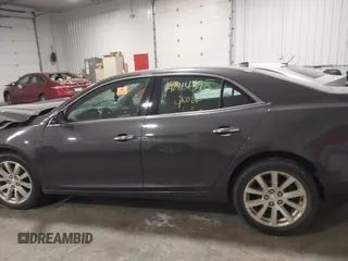 2013 Chevrolet Malibu LTZ with VIN 1G11H5SA1DF281933, listed as a IAAI auction lot 42114395 with 193,550 mi miles and . Bid and sale history available at DreamBid. Image 14.