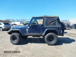 2003 Jeep Wrangler Sport with VIN 1J4FA49S03P343285, listed as a IAAI auction lot 41823684 with 201,723 mi miles and . Bid and sale history available at DreamBid. Image 15.