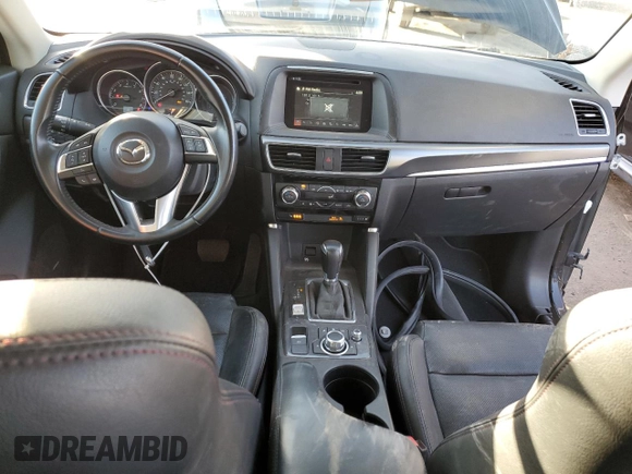 2016 Mazda CX-5 Grand Touring with VIN JM3KE4DY0G0731384, listed as a Copart auction lot 44741695 with 58,727 mi miles and Salvage Title. Bid and sale history available at carsss.com. Image 8.
