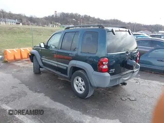 2005 Jeep Liberty Sport with VIN 1J4GL48K15W631101, listed as a IAAI auction lot 41217588 with 168,378 mi miles. Bid and sale history available at carsss.com. Image 3.
