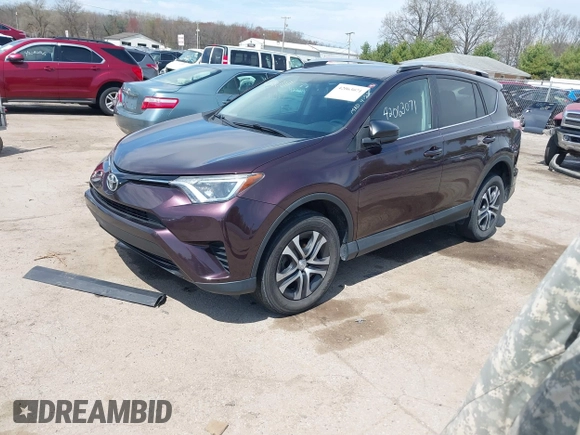 2016 Toyota RAV4 LE with VIN 2T3ZFREV8GW310580, listed as a IAAI auction lot 42063071 with 104,099 mi miles and . Bid and sale history available at DreamBid. Image 18.