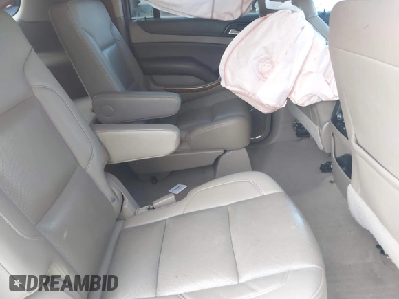 2019 Chevrolet Suburban LT with VIN 1GNSCJKC1KR146104, listed as a IAAI auction lot 41103371 with 108,727 mi miles. Bid and sale history available at carsss.com. Image 8.