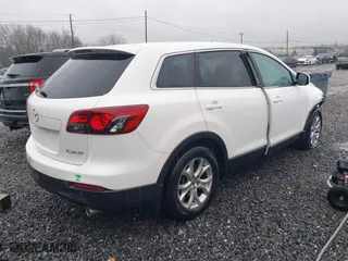 2015 Mazda CX-9 Touring with VIN JM3TB2CA1F0449033, listed as a IAAI auction lot 41549205 with 95,106 mi miles. Bid and sale history available at carsss.com. Image 4.