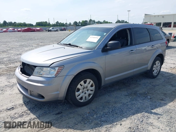 2015 Dodge Journey SE z VIN 3C4PDCAB0FT698674, wystawiony jako IAAI lot #42308994 z przebiegiem 97 640 mil mil oraz . Historia ofert i sprzedaży dostępna na DreamBid. Obrazek 2.