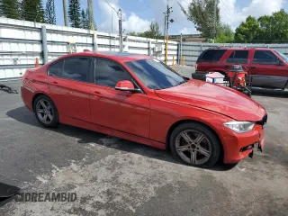2013 BMW 3 Series 328i xDrive with VIN WBA3B3C5XDJ810958, listed as a Copart auction lot 60620005 with 143,589 mi miles and Salvage title. Bid and sale history available at DreamBid. Image 4.