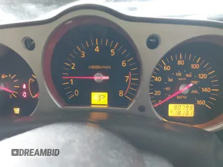 2005 Nissan 350Z Touring z VIN JN1AZ36A15M758086, wystawiony jako IAAI lot #41473598 z przebiegiem 90 799 mil mil oraz . Historia ofert i sprzedaży dostępna na DreamBid. Obrazek 7.