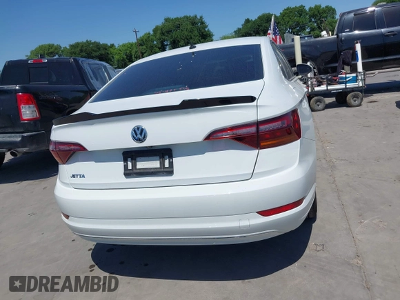 2019 Volkswagen Jetta S z VIN 3VWCB7BU9KM144272, wystawiony jako IAAI lot #41997518 z przebiegiem 91 950 mil mil oraz . Historia ofert i sprzedaży dostępna na DreamBid. Obrazek 16.