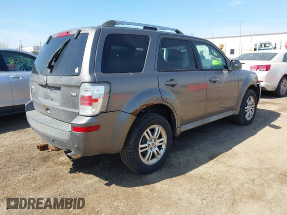 2010 Mercury Mariner Premier with VIN 4M2CN9HG3AKJ12523, listed as a IAAI auction lot 42114096 with 265,108 mi miles and . Bid and sale history available at DreamBid. Image 4.