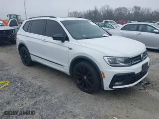 2020 Volkswagen Tiguan SE with VIN 3VV2B7AX1LM151388, listed as a IAAI auction lot 41480146 with 154,567 mi miles. Bid and sale history available at carsss.com. Image 1.