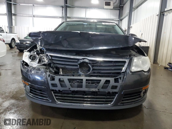 2010 Volkswagen Passat z VIN WVWJK9AN4AE096359, wystawiony jako Copart lot #50740075 z przebiegiem 196 126 mil mil oraz Szkoda całkowita • Salvage title. Historia ofert i sprzedaży dostępna na DreamBid. Obrazek 5.