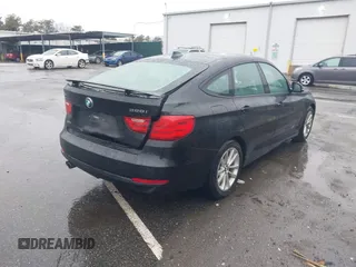 2014 BMW 3 Series 328i Gran Turismo xDrive z VIN WBA3X5C56ED556632, wystawiony jako IAAI lot #41962313 z przebiegiem 99 512 mil mil oraz . Historia ofert i sprzedaży dostępna na DreamBid. Obrazek 4.