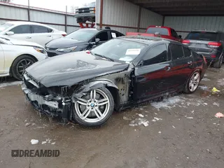 2015 BMW 6 Series 640i with VIN WBA6A0C55FGB53603, listed as a IAAI auction lot 41543996 with 71,046 mi miles and . Bid and sale history available at DreamBid. Image 18.