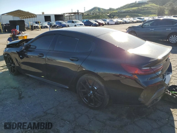 2023 BMW 8 Series M850i with VIN WBAGV8C06PCL57473, listed as a Copart auction lot 39398193 with Not provided miles and . Bid and sale history available at DreamBid. Image 2.