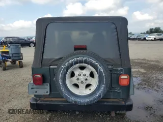 2003 Jeep Wrangler Sahara with VIN 1J4FA59S73P308250, listed as a Copart auction lot 64305965 with 186,288 mi miles and Clean title. Bid and sale history available at DreamBid. Image 6.